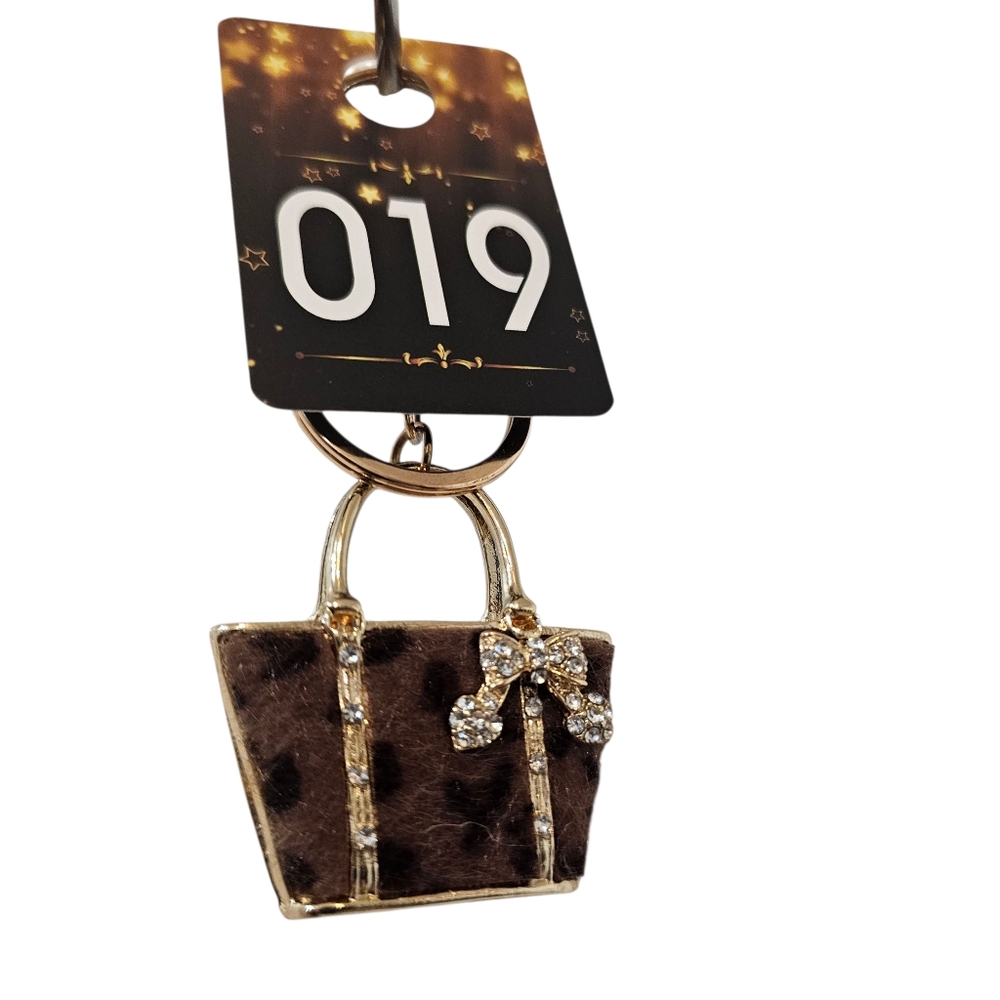 New ANIMAL PRINT GOLD FUR BAG CHARM
